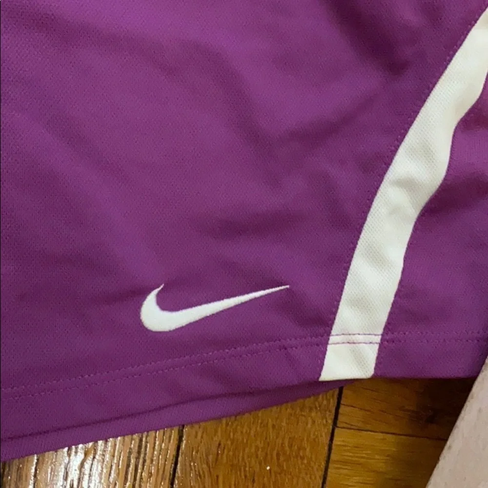 Nike purple dri-fit shorts with small pocket